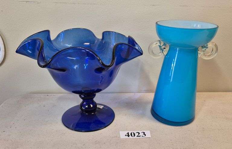 Two blue glass vases