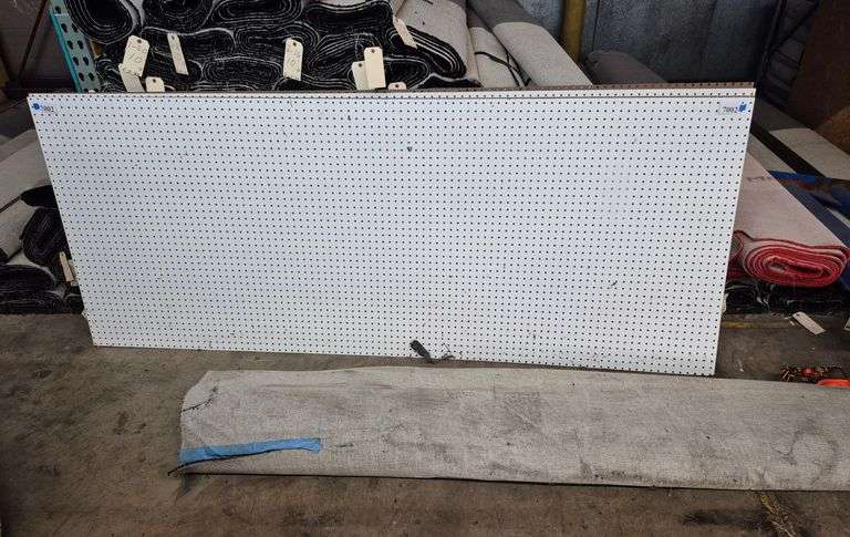 Four sheets of pegboard