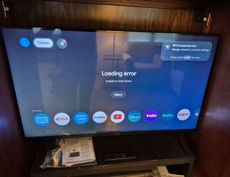 Sony Bravia 43 in. Smart TV with remote and manuals