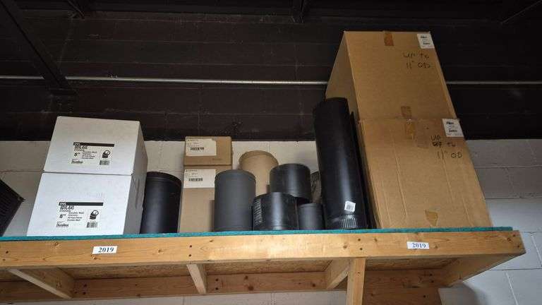 Inventory on top shelf including attic insulation shield, vents, etc.