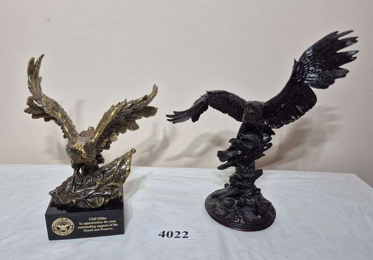 Two resin eagle sculptures / figurines