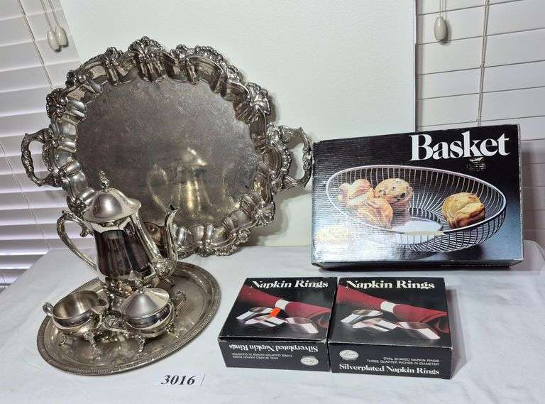 Silverplate tea set, large-footed tray, bread basket and napkin rings