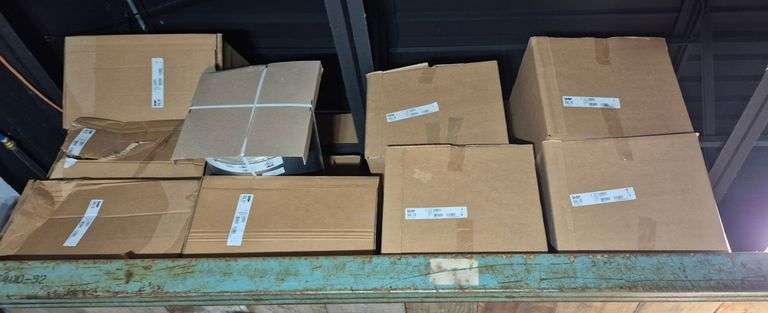 Inventory on top shelf including gas chimneys, etc.