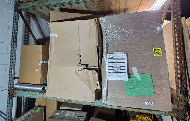 Inventory on 2nd shelf including fireplace insert, vent kit, etc.