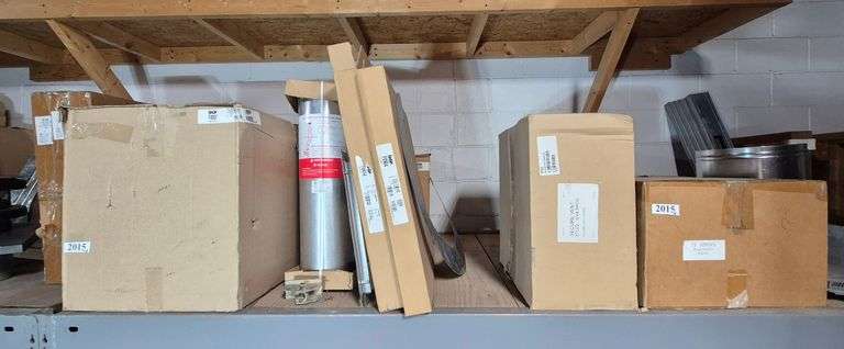 Inventory on 2nd shelf including vent kits, terminal adapter kit, spacers, etc.