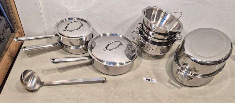 Pans including cuisinart, roasting pan, four stainless strainers, ladle