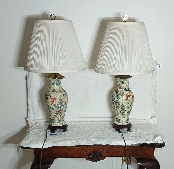 Pair of ceramic and brass table lamps with wood bases