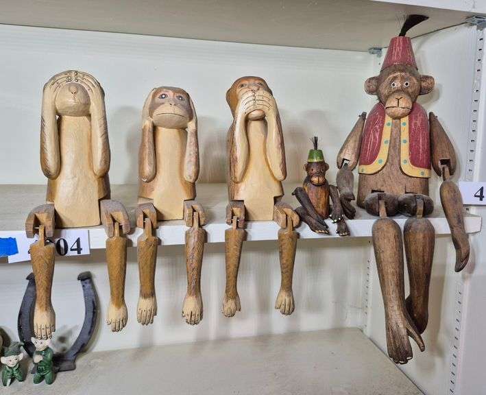 Shelf sitting wood monkeys
