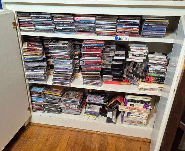 Many CDs, some cassette and VHS tapes
