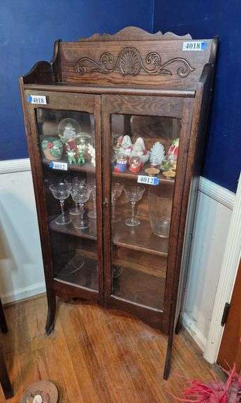 Small antique oak display/ china cabinet with carved backsplash