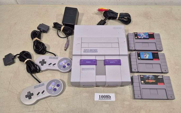 Super Nintendo console, controllers, Power supply, three games