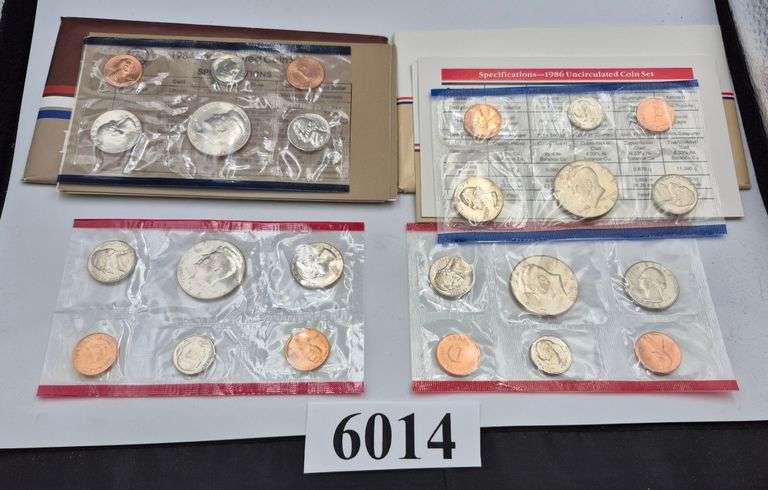 1984 and 1986 US Mint Uncirculated Coin Sets in envelopes