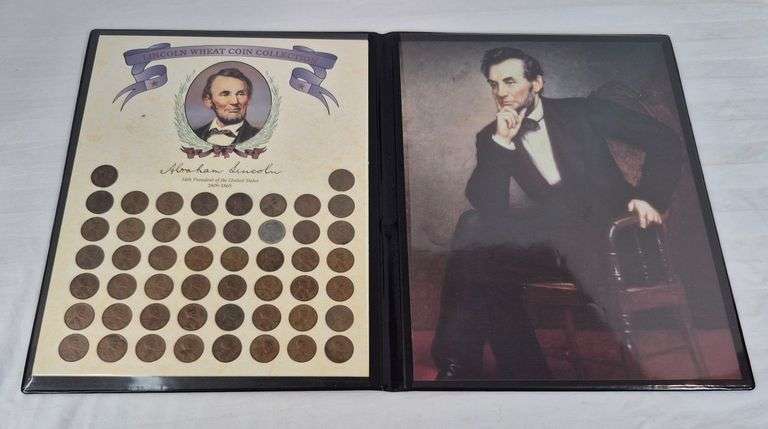 Wheat pennies in United States commemorative Fine Art Gallery folio with Lincoln portrait