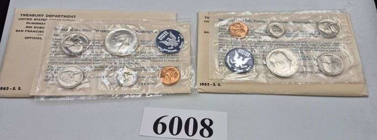 Two United States Special Mint Sets (SMS) in envelopes