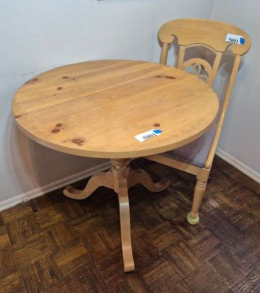 Round Pine dinette table and one chair