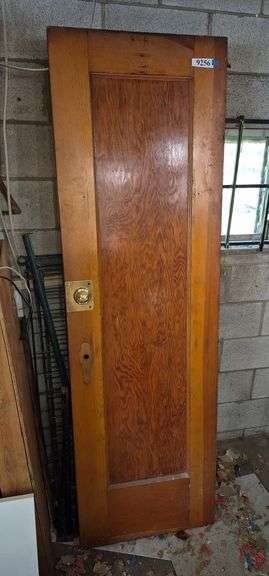 Narrow vintage interior door with key