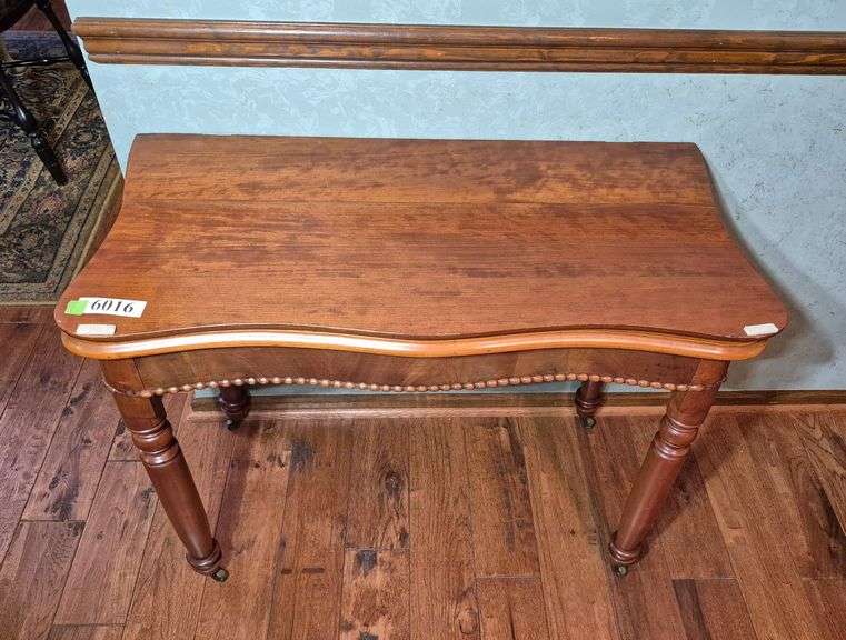 Antique cherry flip lid turn top table