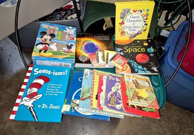 Large assortment of children's books including golden books, plastic storage tote