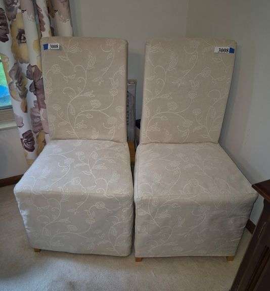 Pair of IKEA slip-covered dining chairs