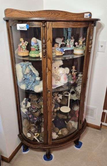 Oak curved glass curio cabinet