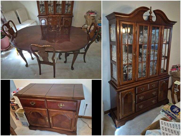 Cherry finish dining set including oval table, leaf, 4 chairs, lighted china cabinet, and server...
