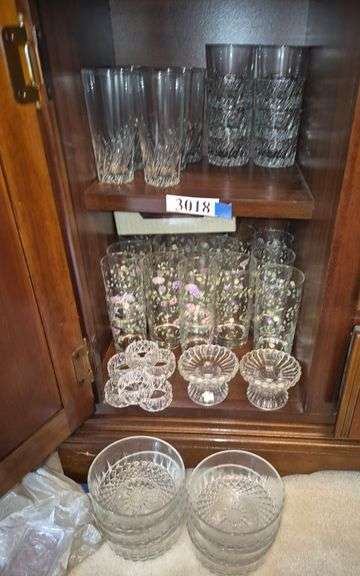 Drinking glasses, candle holders, candles, plastic napkin rings, glass bowls, Etc