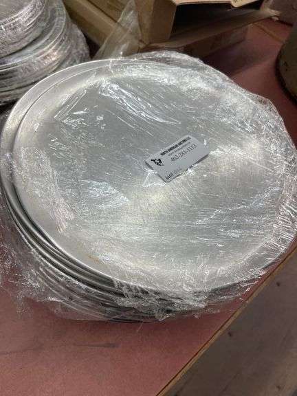 STACK OF PIZZA PANS