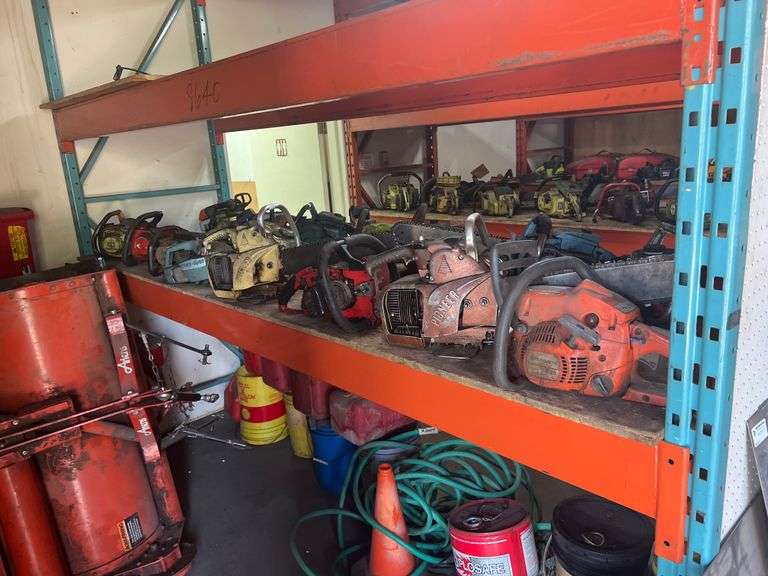 SHELF OF CHAIN SAWS UNKNOWN COND