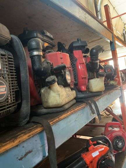 SHELF OF BACKPACK BLOWERS UNKNOWN CONDITION