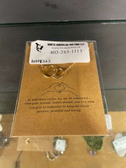 "WHAT GOES AROUND COMES AROUND" NECKLACE