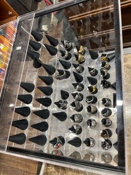 SMALL PLASTIC DISPLAY CASE WITH ASSORT. SIZE MENS RINGS