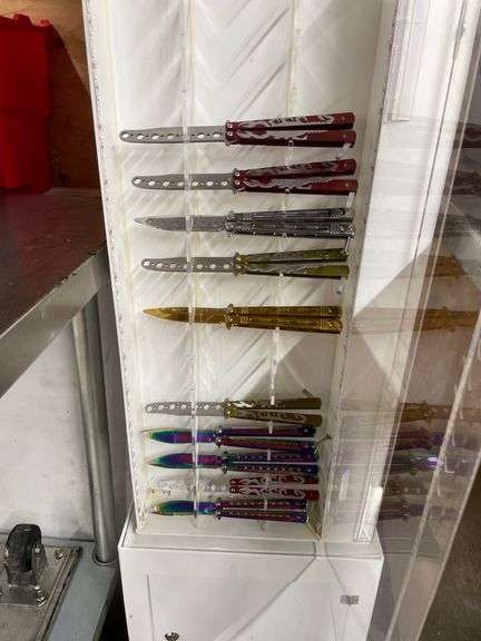 APPROX. 5.5FT TALL DISPLAY CASE W/CONTENTS INSIDE