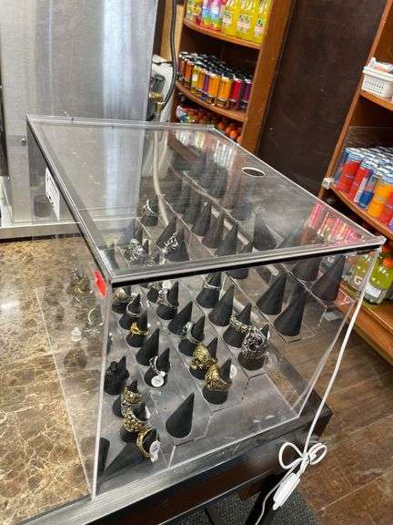 SMALL PLASTIC DISPLAY CASE WITH ASSORT. SIZE MENS RINGS