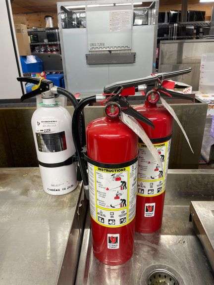 3PCS. 1 SMALL WHITE 2 LARGE RED FIRE EXTINGUISHERS