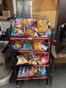 SHELF ON WHEELS WITH ASSORT. CHIPS / SNACKS