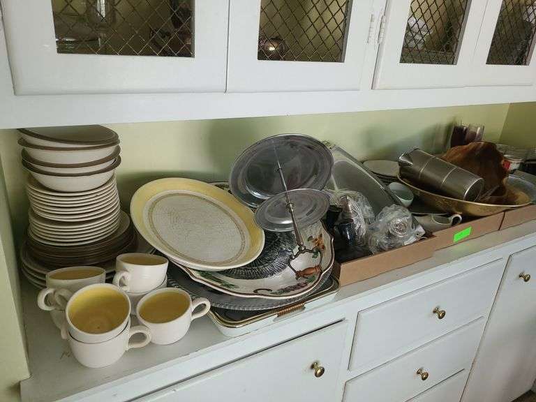 Various Dishes in Living Room Ness Bros Realtors & Auctioneers
