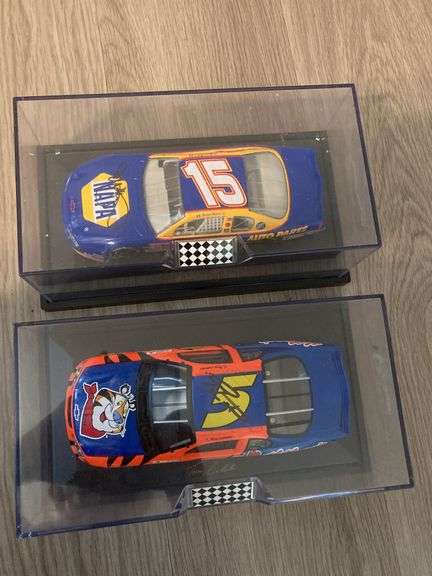 2 signed diecast cars in case and 2 race car driver cards