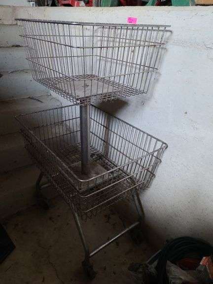 Rolling Metal Wire Basket Stand in Barn
