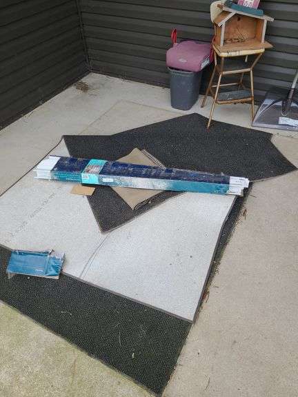 Cosco Chair, Snow Shovel and Rugs on Front Porch
