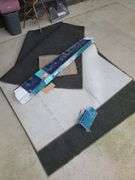 Cosco Chair, Snow Shovel and Rugs on Front Porch