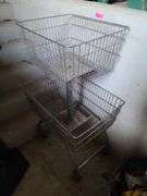 Rolling Metal Wire Basket Stand in Barn