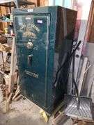 30x65x23 John Deere Gun Safe in Garage