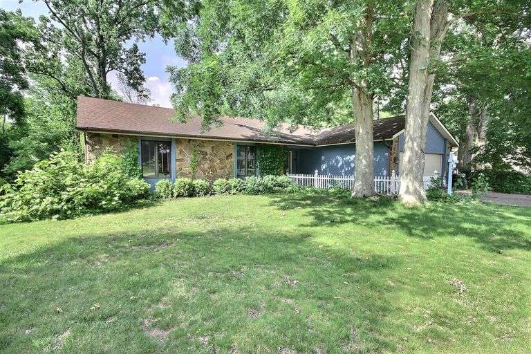3 Bed Ranch on Full Basement with all-season room overlooking wooded lot