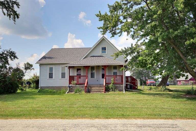 3 Bedroom Country Home features 26x36 Horse Barn with 5 Stalls and additional 46x58 Barn on 1.46 Acres