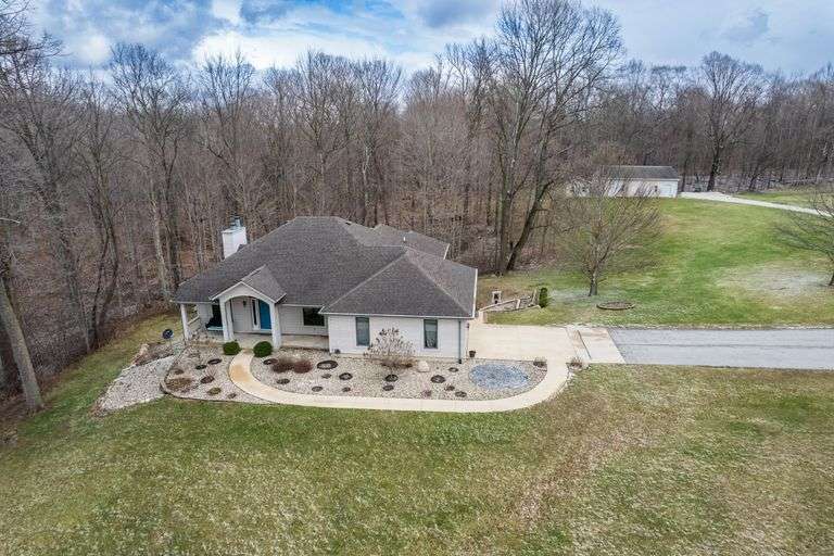 3 Bedroom Home on Beautiful 8+ Partially Wooded Acres, 32 x 40 Heated Workshop/Garage & Finished Walkout Basement