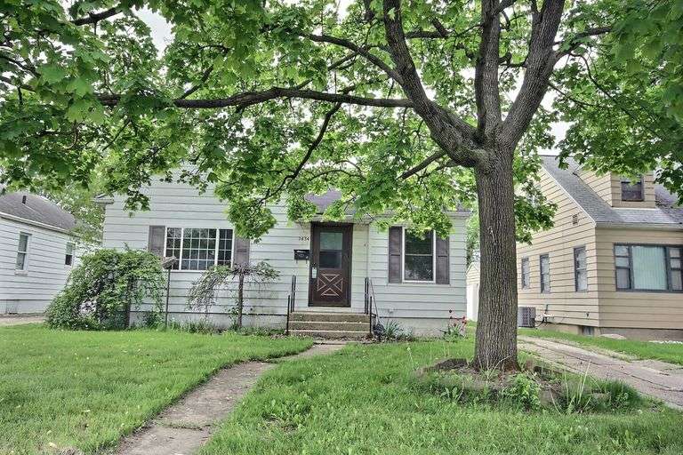 Calling all investors, flippers, and DIY enthusiasts! 2 Bedroom Ranch with Extra Large Detached Garage and Partially Finished Basement