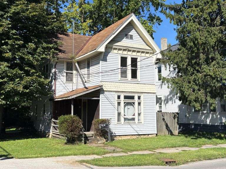 INVESTMENT OPPORTUNITY:  Duplex with 2 Beds/1 Bath & 1 Bed/1 Bath with Partial Basement