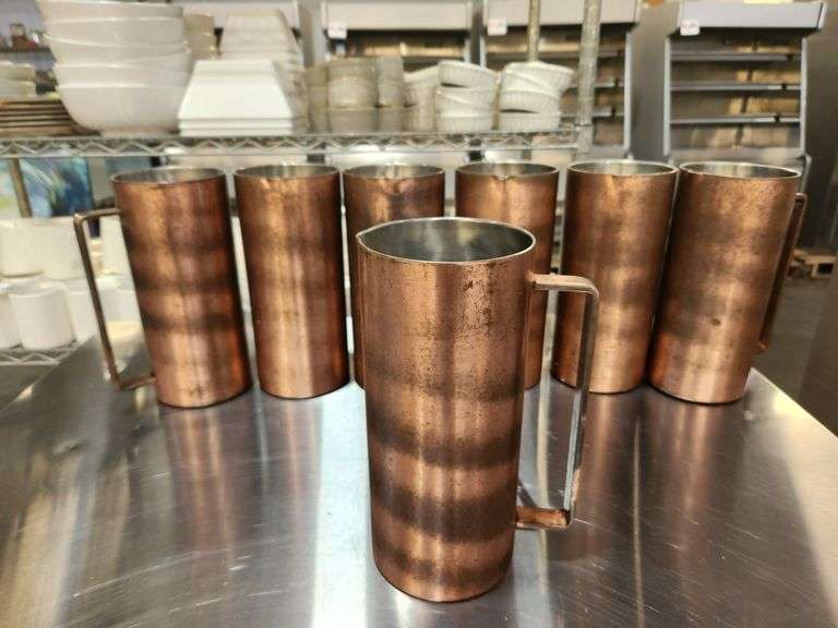 Bid is X 7 Copper Pitchers 10"