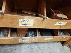 Wooden Hardware Shelf w/ Assorted Contents – Screws, Brackets, Pins, and More – Located in Factory Outlet