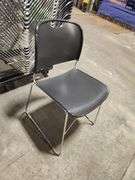 Bid x 25 – Black Stackable Office / Conference Chairs with Rolling Rack